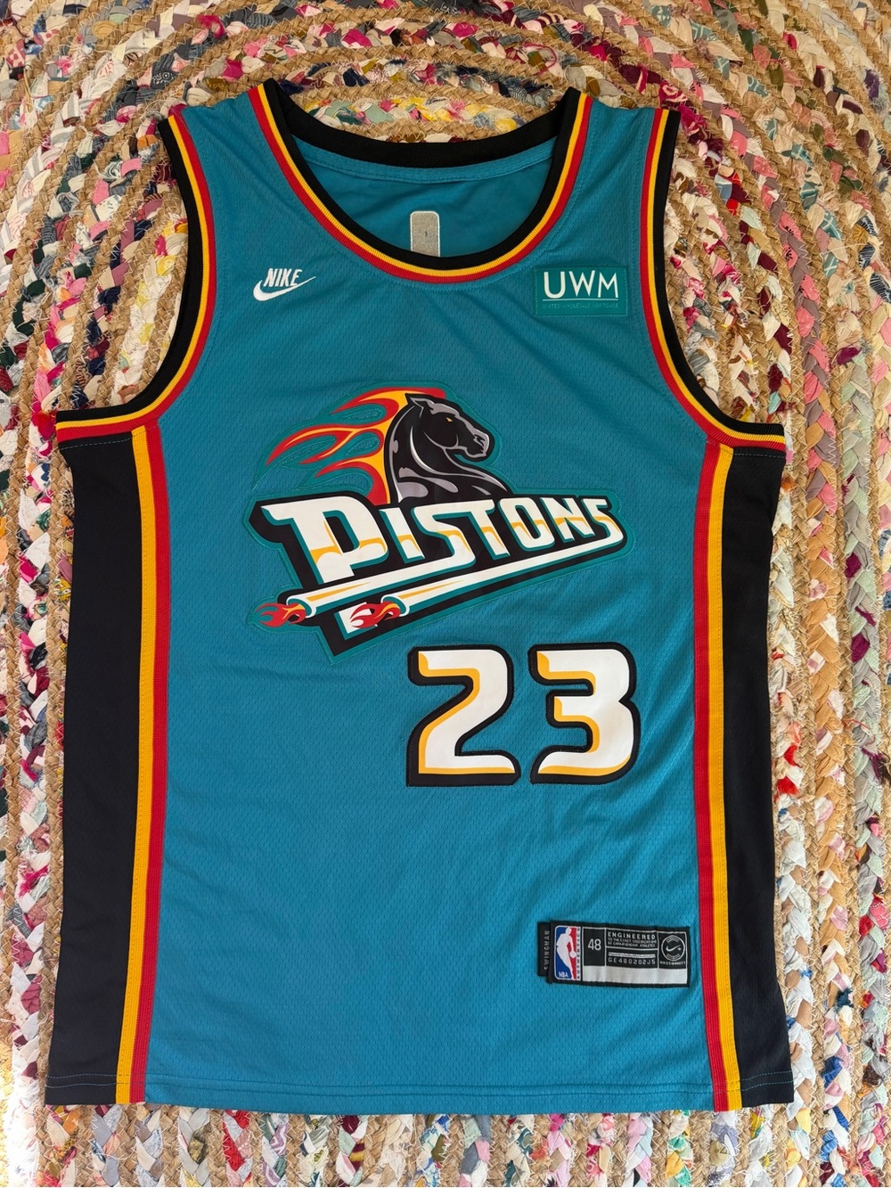 Nike Teal Pistons Jersey with Black, Red and Yellow Trim